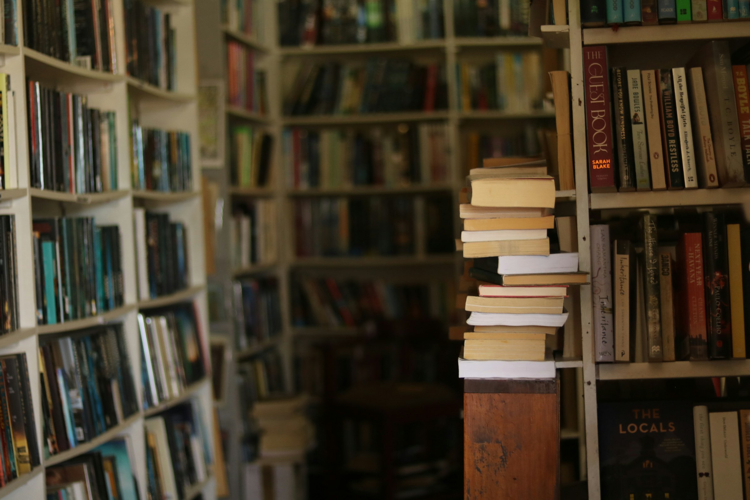 Law books stacked and ready to be packed
